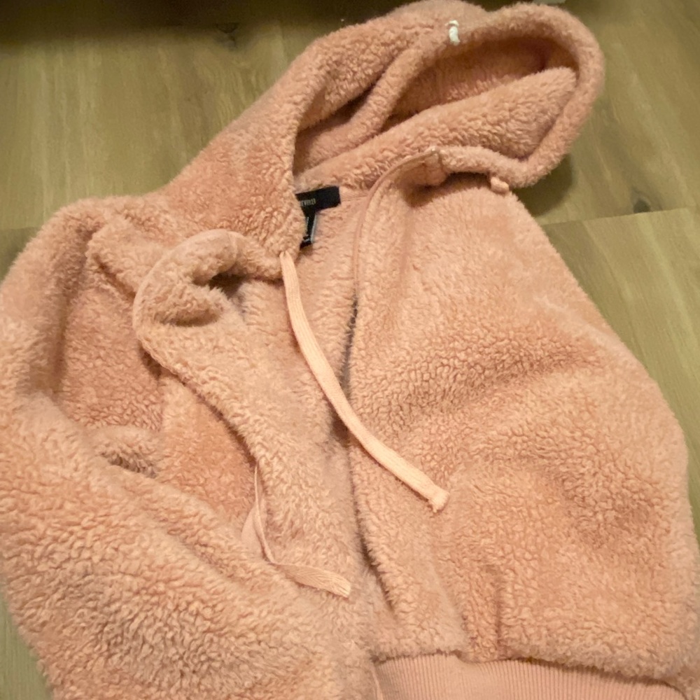 a pink fluffy jacket